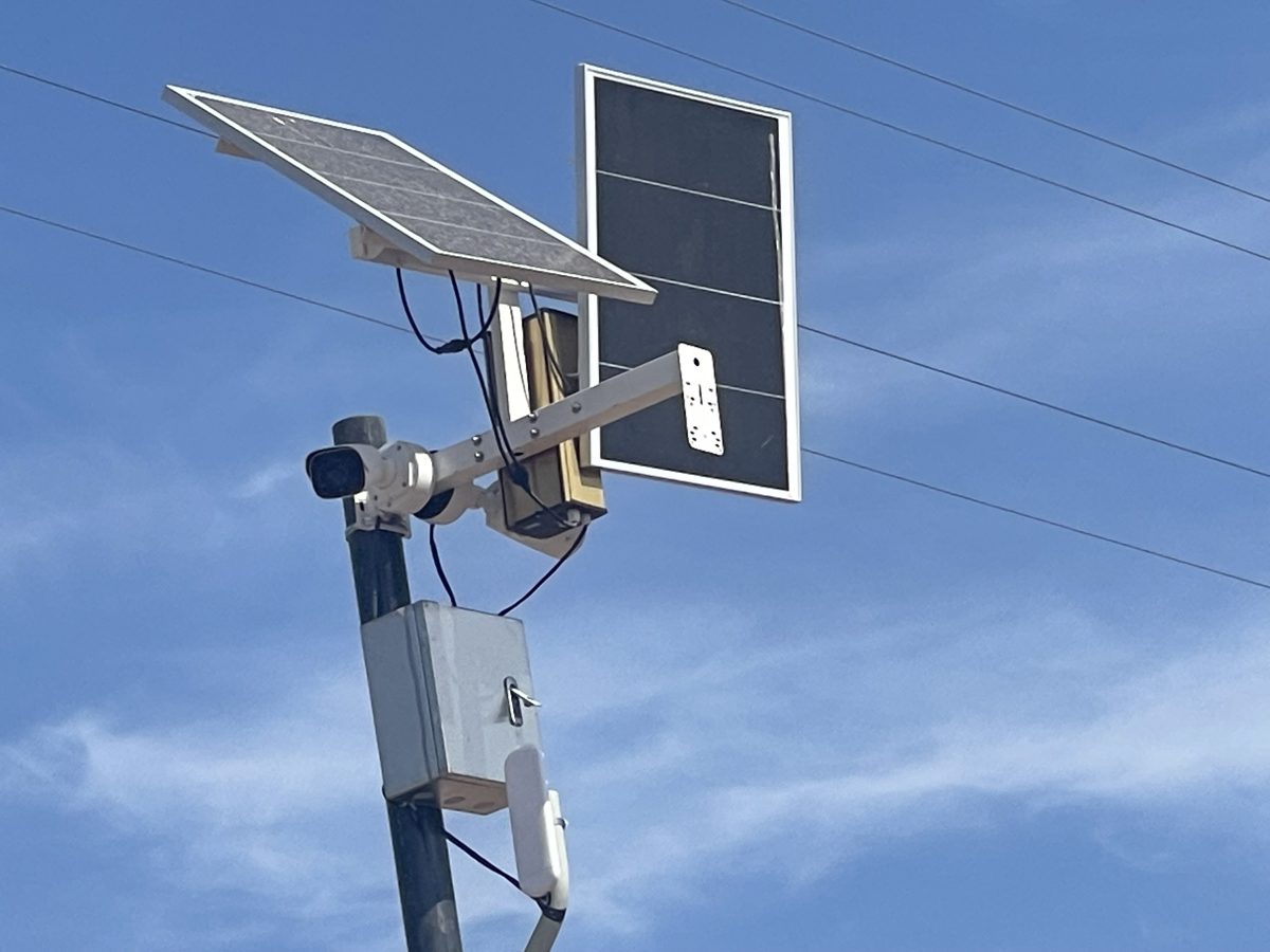 Solar-powered camera pole installation